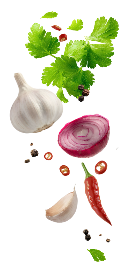Garlic, red onion, chili, and herbs on the right side, white background.